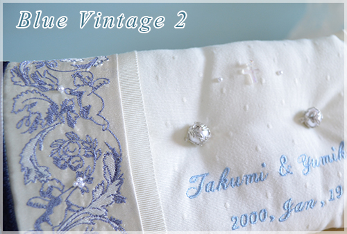 天使のオリジナル刺繍リボンが特徴のリングピロー ブルー ビンテージ モノホワイト